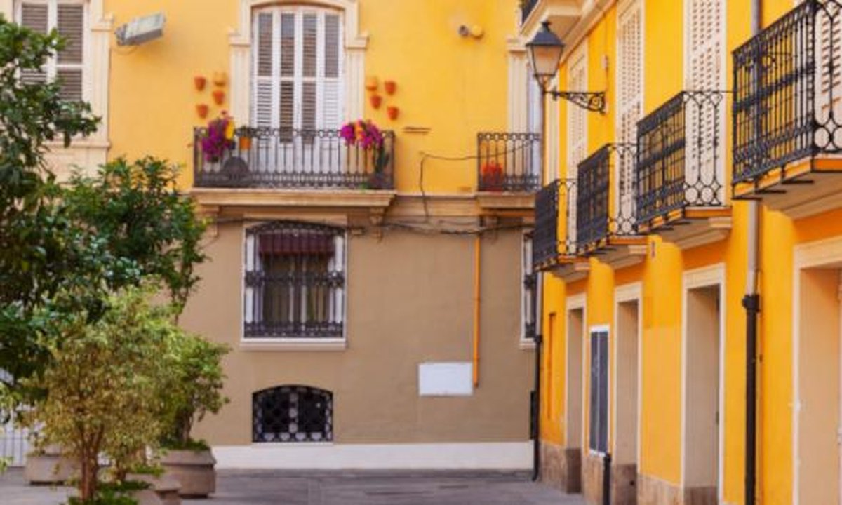 Small furnished apartment interior illustrating cheap apartments available in Spain